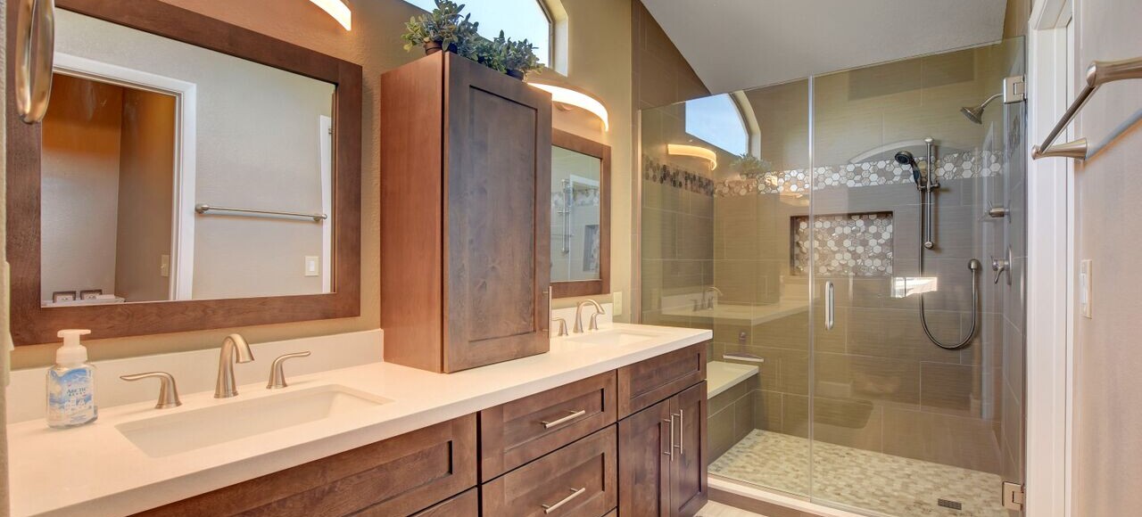 bathroom remodeled in las vegas with a new shower cabinets and mirrors