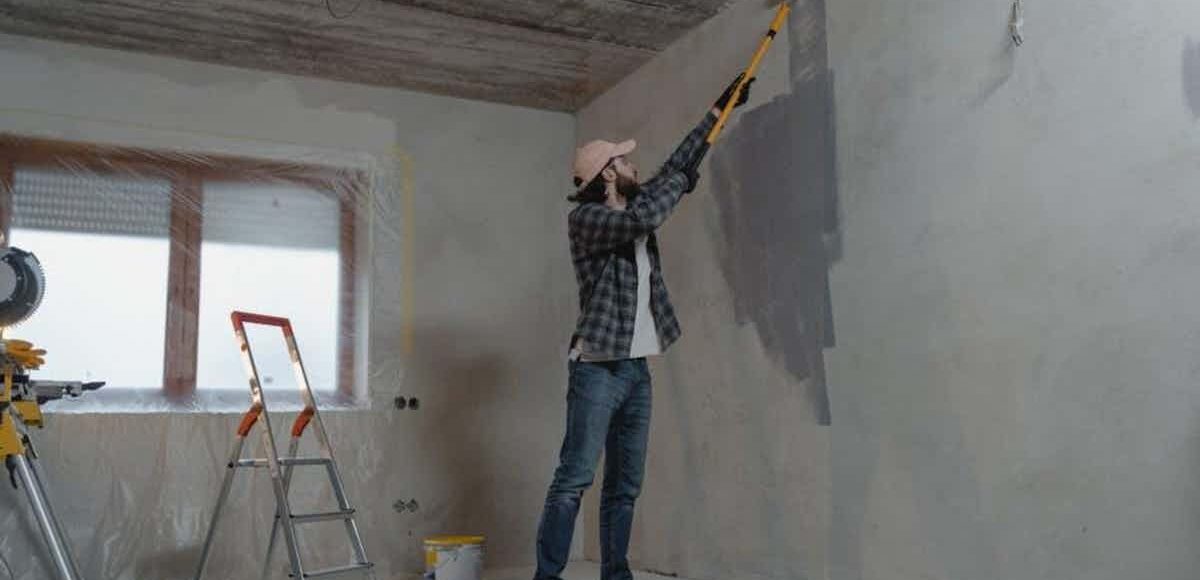 person working on an old home renovation